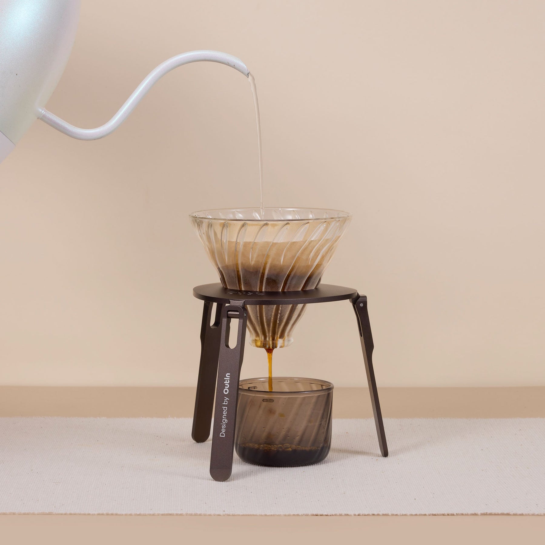 OutIn Foldable Coffee Stand with stable triangular support